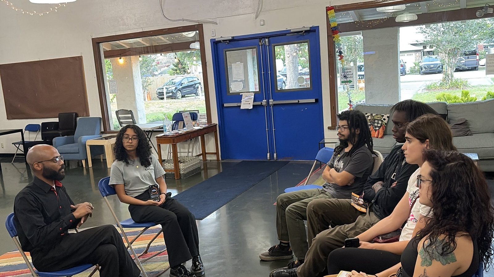 Neighbors gathered at a community town hall in District 7